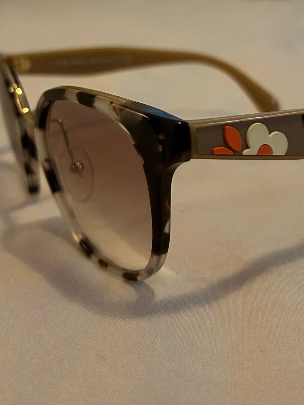 Prada Tortoiseshell Round Sunglasses with  Orange and Cream flower detail